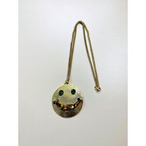 Vintage Gold Tone Smiley Face Necklace with Green Rhinestone Eyes, Stone Teeth